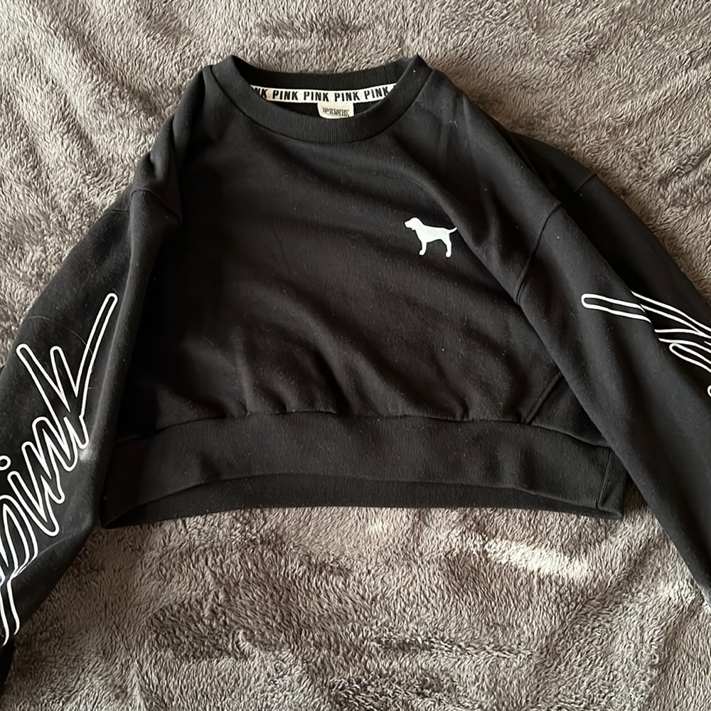Pink sweatshirt. Size xs. Black with white lettering